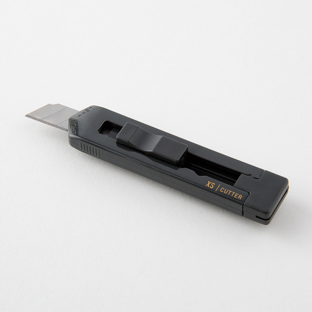 Midori XS Cutter — flat lay
