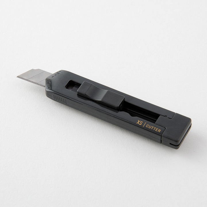 Midori XS Cutter — flat lay