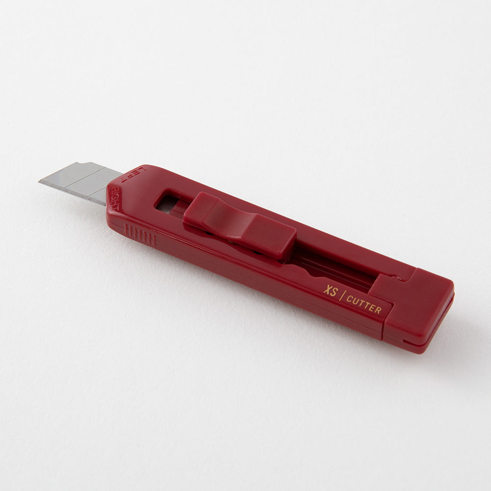 Midori XS Cutter — flat lay