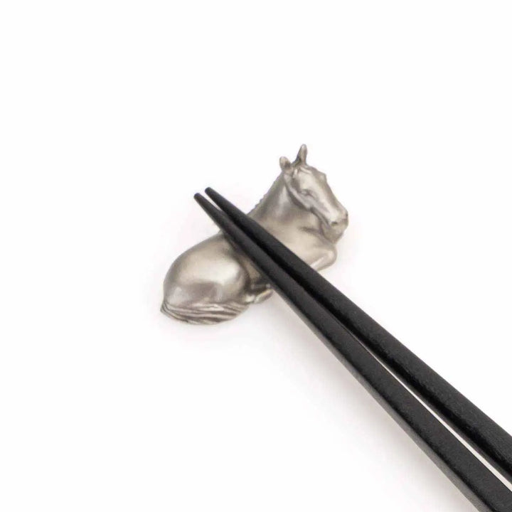 Royal Selangor 2026 Year of the Horse - Chopsticks &amp; Rest Set — in use