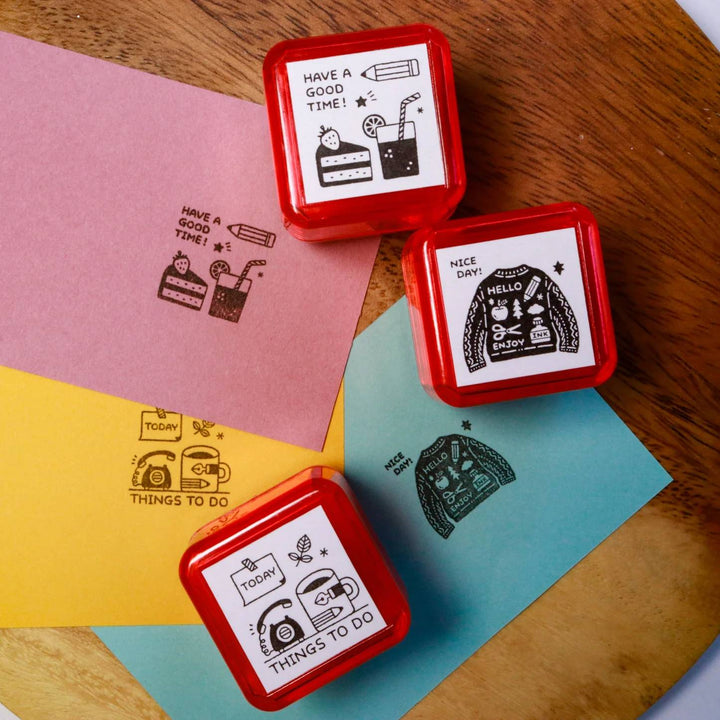 Eric Small Things Pre-Inked Stamp by Sanby Japan, compact black-ink stamp for journaling and planner decoration.