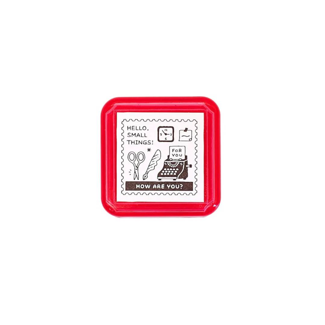 Eric Small Things Pre-Inked Stamp - Postage Stamp featuring a small square postal-themed design by Sanby Japan, displayed with its compact PET casing.