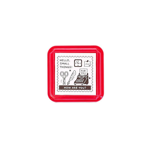 Eric Small Things Pre-Inked Stamp - Postage Stamp featuring a small square postal-themed design by Sanby Japan, displayed with its compact PET casing.