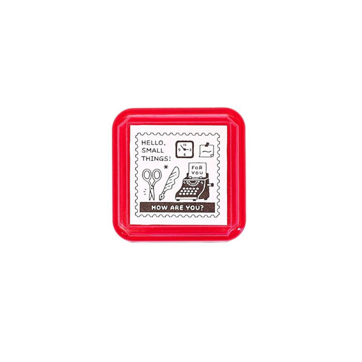 Eric Small Things Pre-Inked Stamp - Postage Stamp featuring a small square postal-themed design by Sanby Japan, displayed with its compact PET casing.