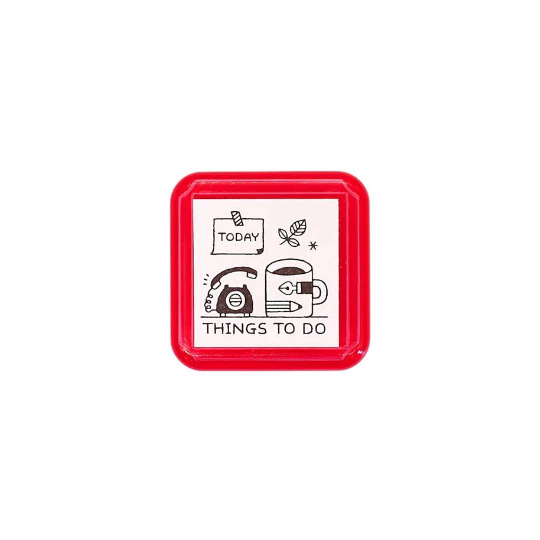 Sanby x Eric Small Things Pre-Inked Stamp – Things To Do, compact Japanese planner stamp with black ink.