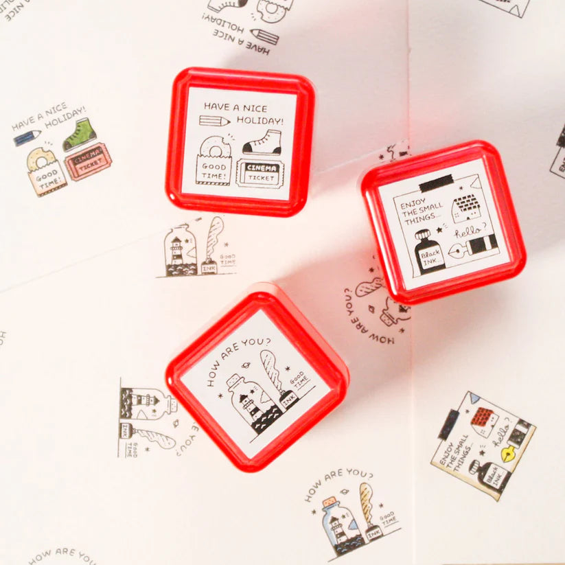Eric Small Things Pre-Inked Stamp by Sanby Japan, compact black-ink stamp for journaling and planner decoration.