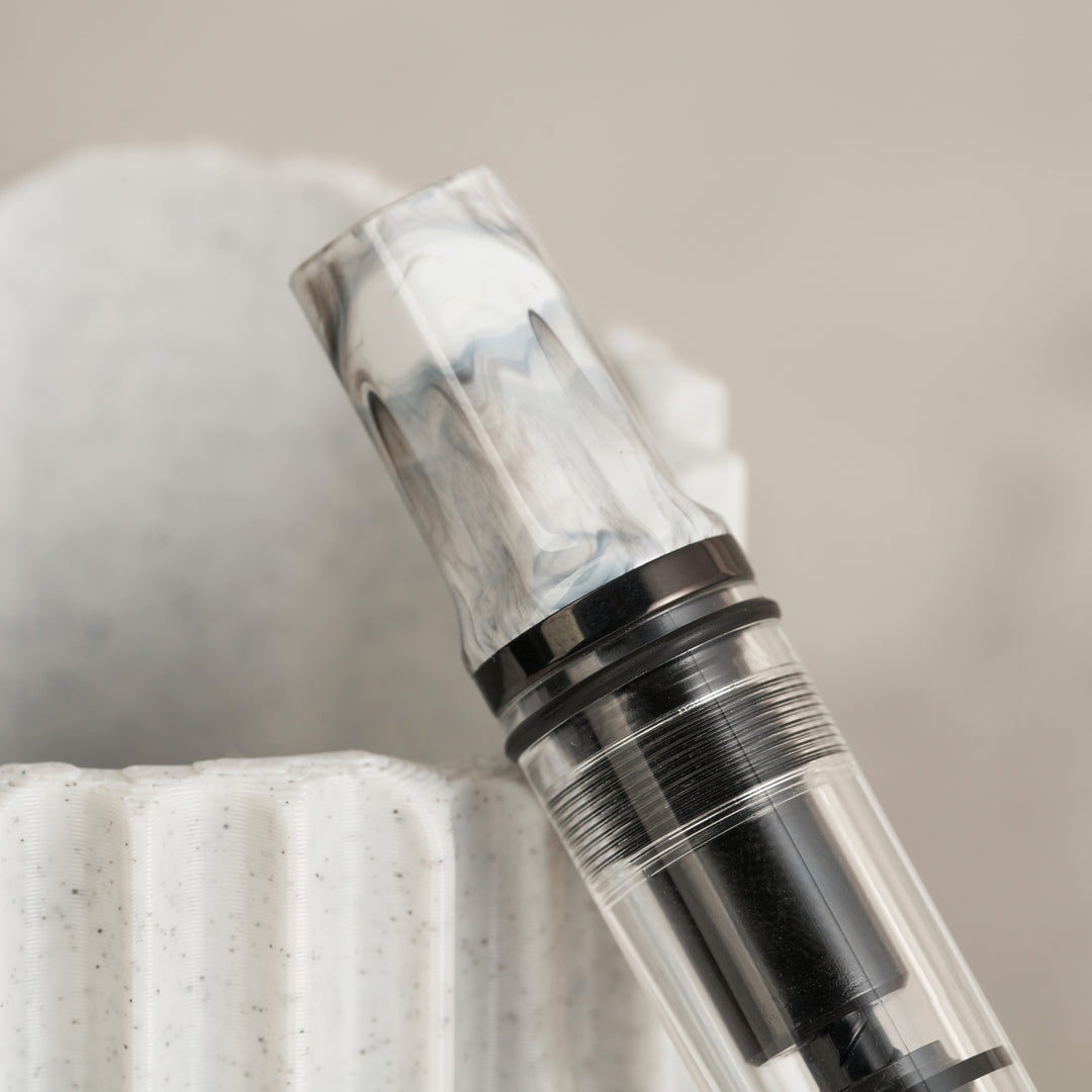 TWSBI ECO Fountain Pen Carrara with Onyx Trim – clear demonstrator barrel, marbled white cap, black stainless steel nib