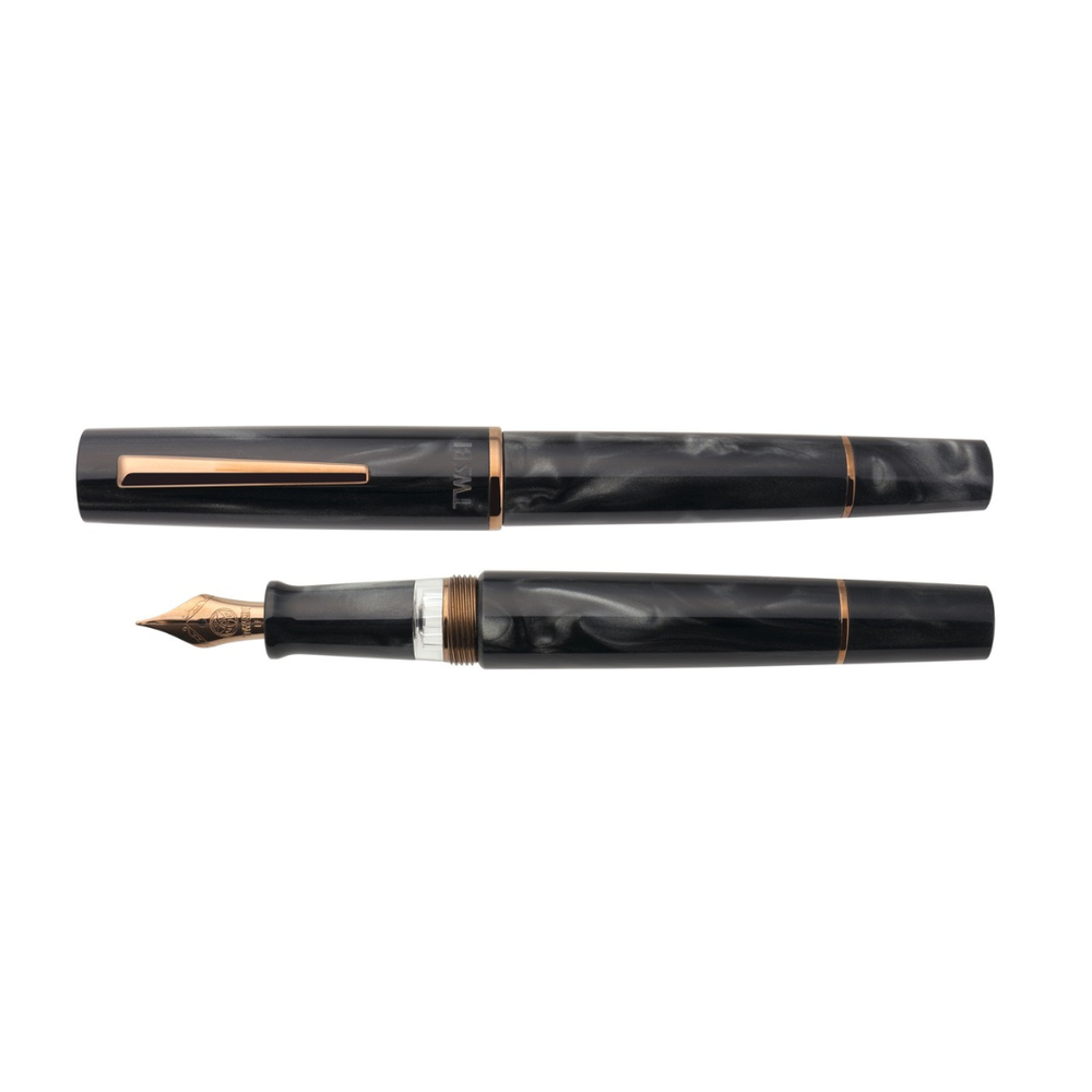 TWSBI Obsidian Fountain Pen — uncapped with cap posted
