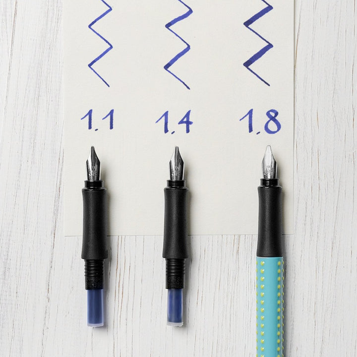 Faber-Castell Grip 2011 Fountain Pen Calligraphy Set Silver — in use