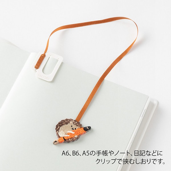 Midori Embroidery Bookmarker Hedgehog — in use