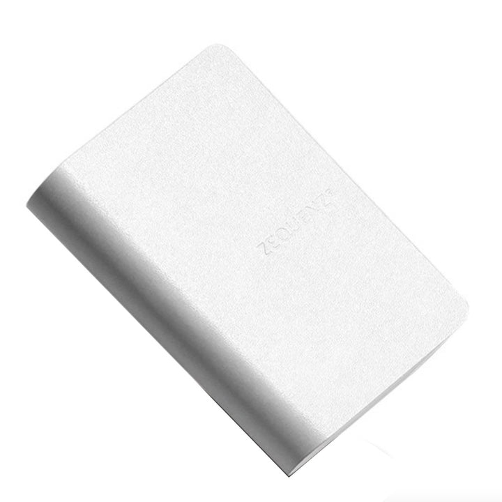 Zequenz Signature Classic Notebook A7 — flat lay