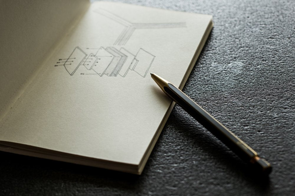 Ystudio Brassing Ballpoint Pen (spring) — uncapped with cap posted