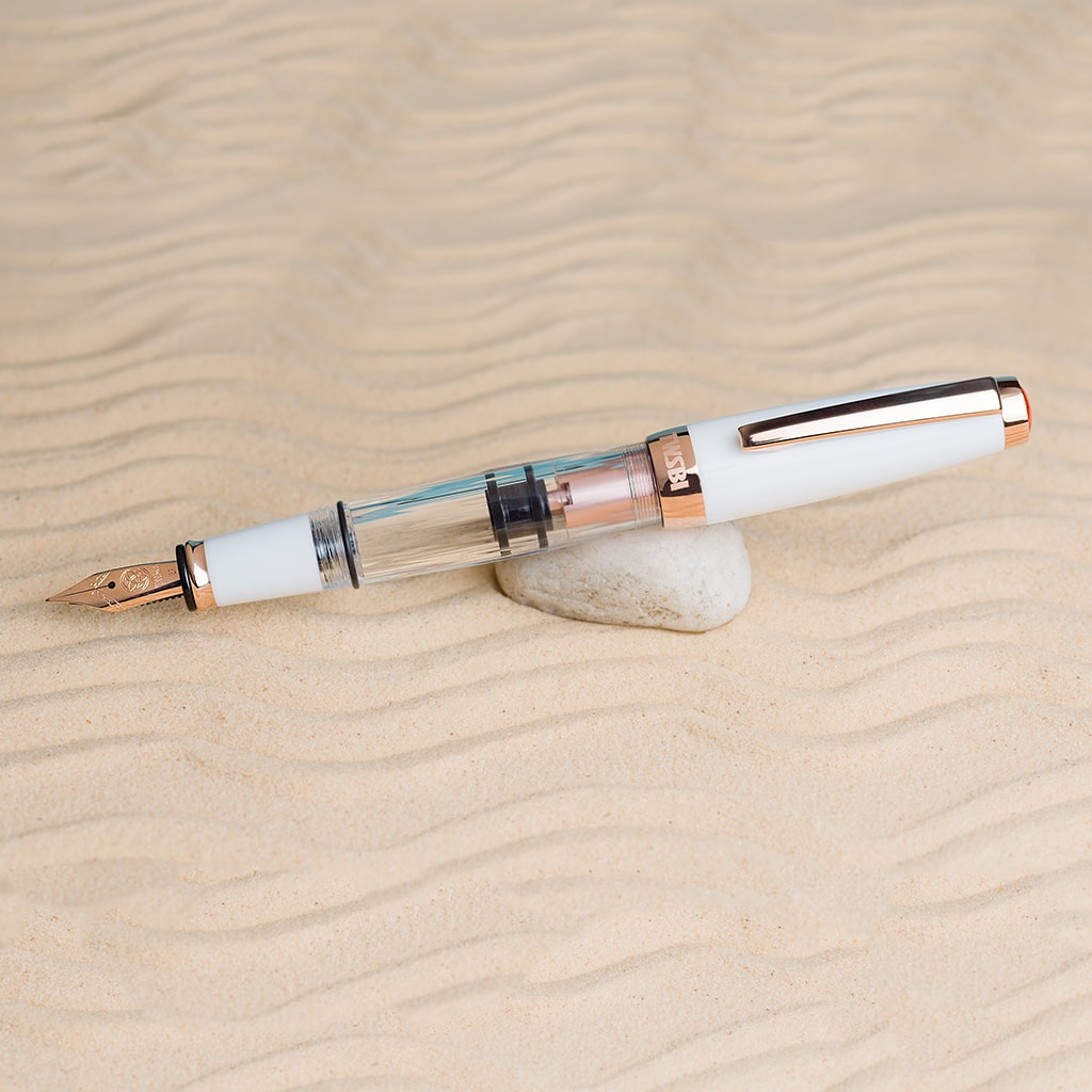 TWSBI Diamond Mini with Rose Gold Trim II Fountain Pen — flat lay