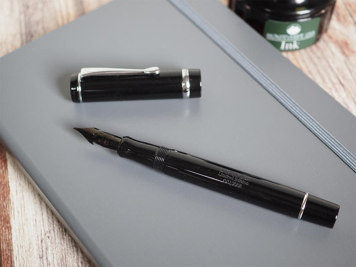 Conklin Duraflex Limited Edition Fountain Pen (Flex Nib) Chrome — flat lay