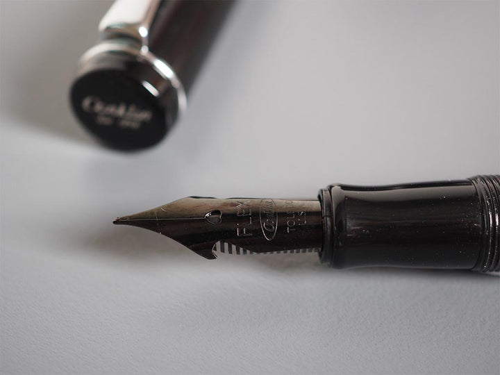 Conklin Duraflex Limited Edition Fountain Pen (Flex Nib) Chrome — flat lay