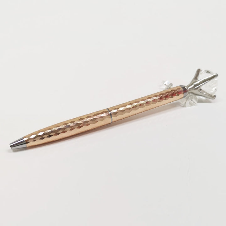 Helen Kelly Diamond Charm Pen Rose Gold — writing at an angle