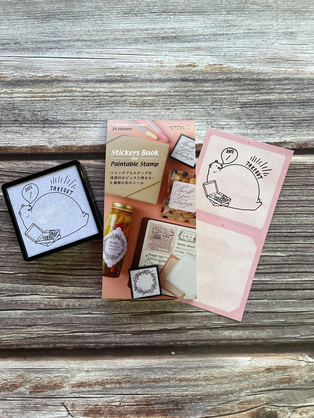 Midori Stickers Book For Pre-Inked Stamp - Warm Colors — flat lay