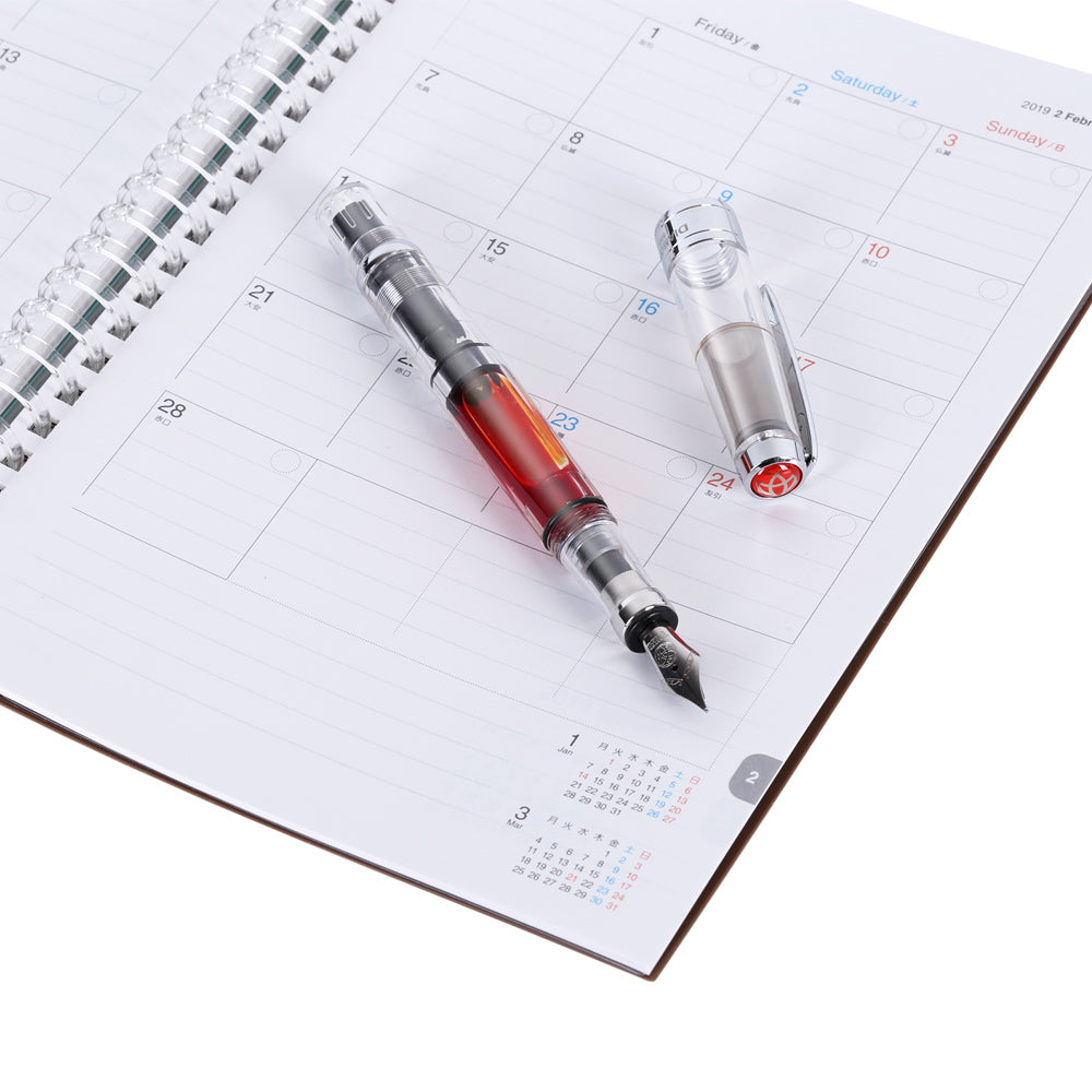 TWSBI Diamond 580 Fountain Pen Clear — flat lay