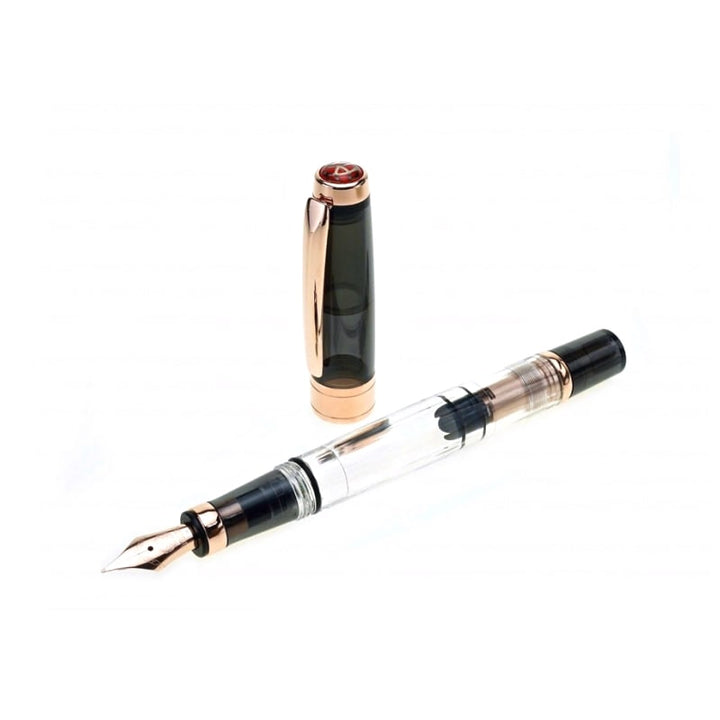TWSBI Diamond 580 Fountain Pen Smoke RG II — flat lay