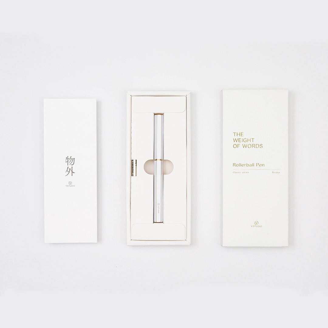 Ystudio Classic Revolve Rollerball Pen - White — flat lay