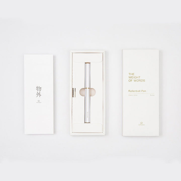 Ystudio Classic Revolve Rollerball Pen - White — flat lay