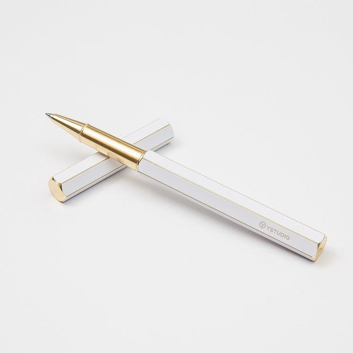 Ystudio Classic Revolve Rollerball Pen - White — flat lay