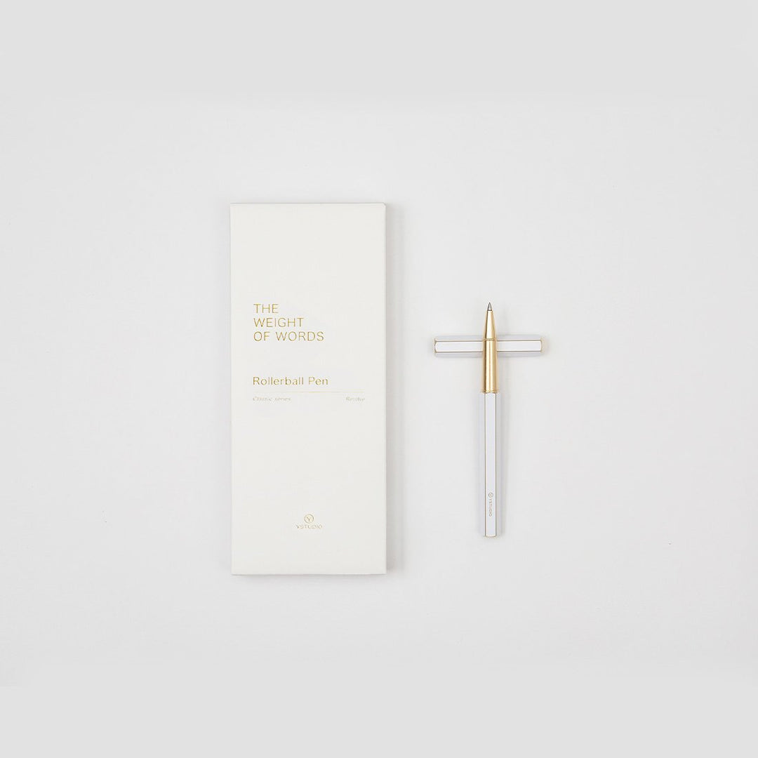 Ystudio Classic Revolve Rollerball Pen - White — flat lay