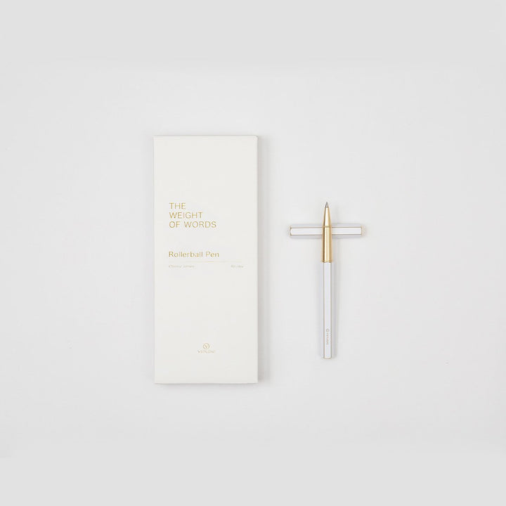 Ystudio Classic Revolve Rollerball Pen - White — flat lay