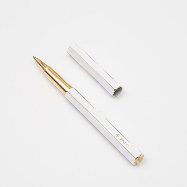 Ystudio Classic Revolve Rollerball Pen - White — flat lay