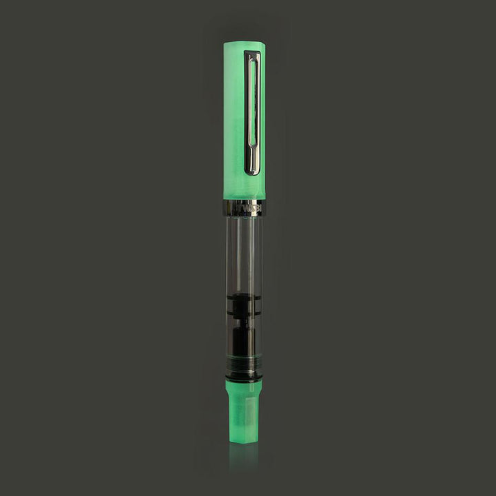 TWSBI ECO Fountain Pen Glow Green — flat lay