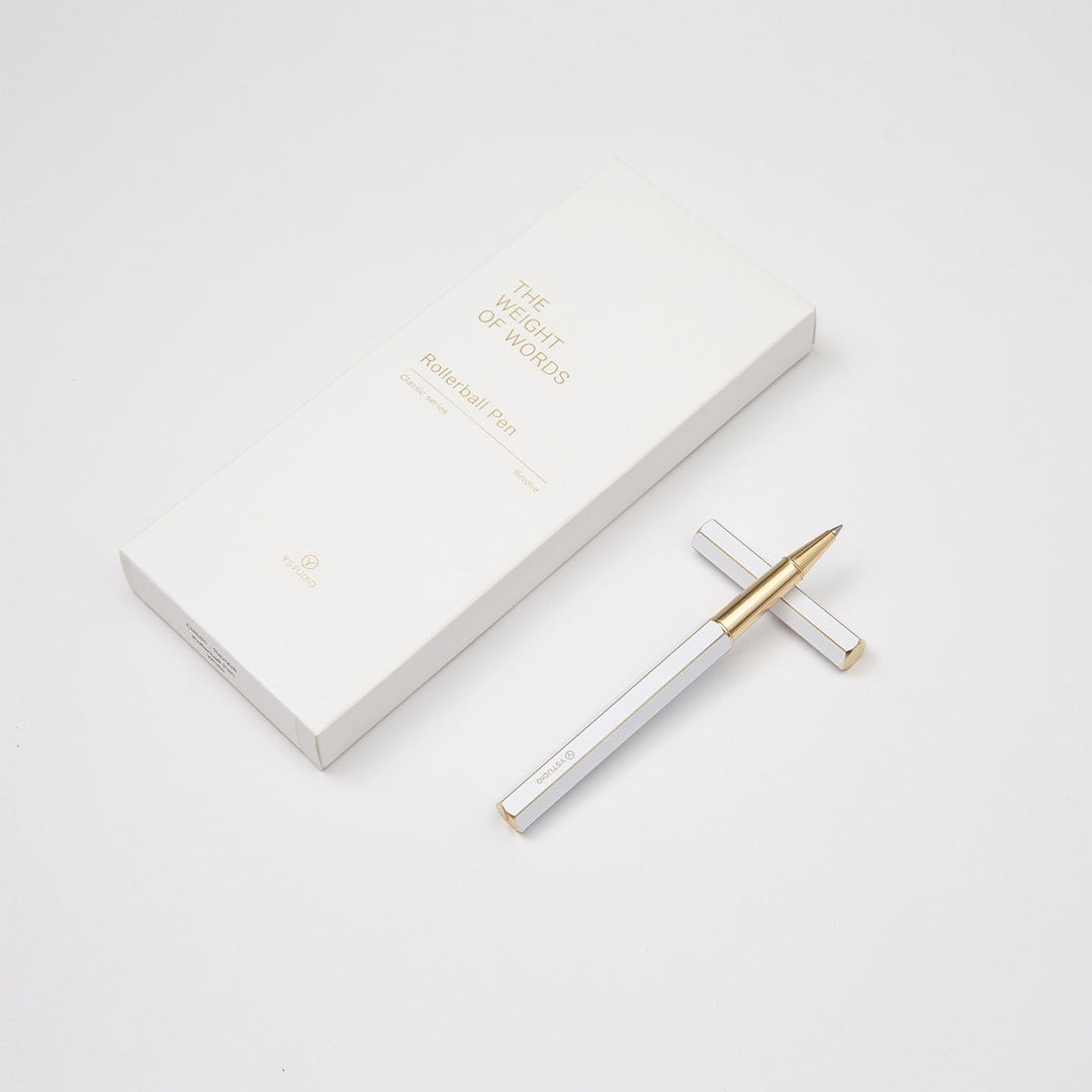 Ystudio Classic Revolve Rollerball Pen - White — flat lay