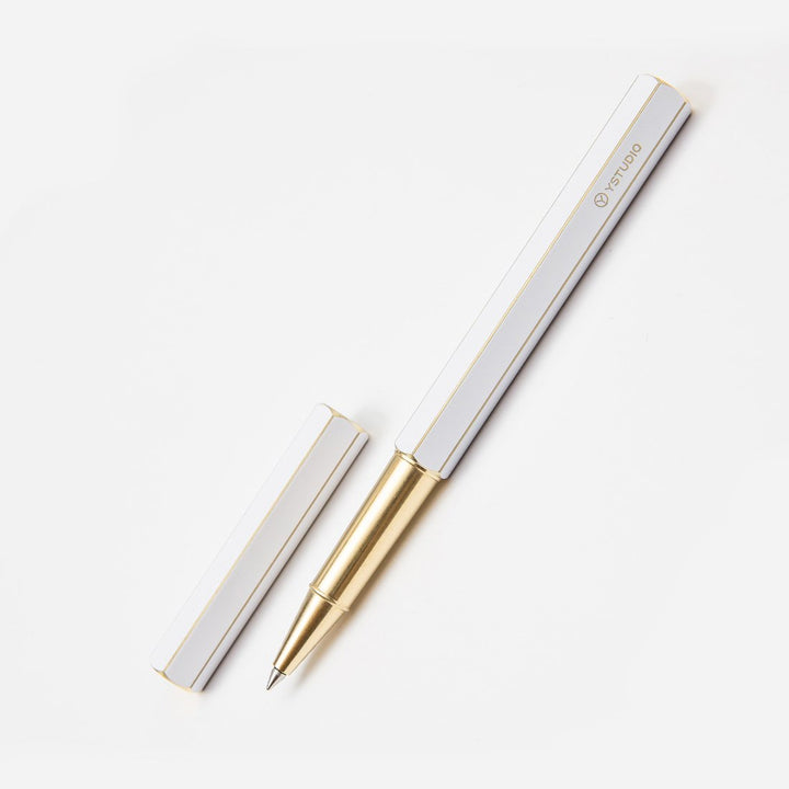 Ystudio Classic Revolve Rollerball Pen - White — flat lay
