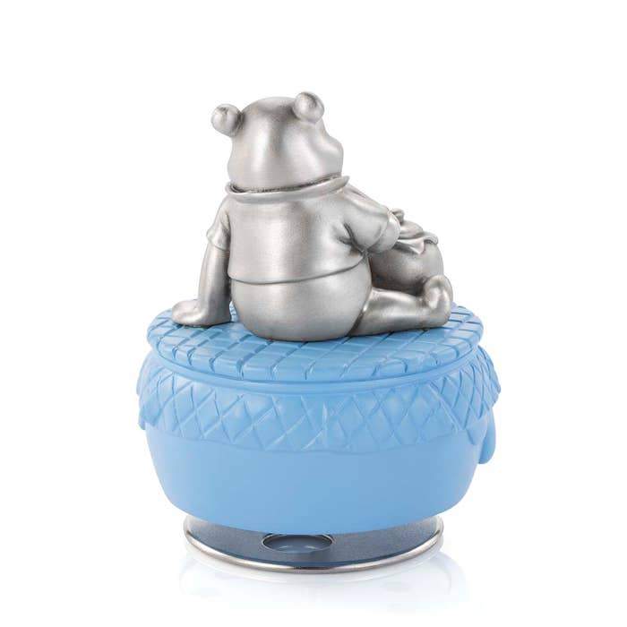 Royal Selangor Disney Music Carousels - Winnie The Pooh Limited Edition Gilt — in use