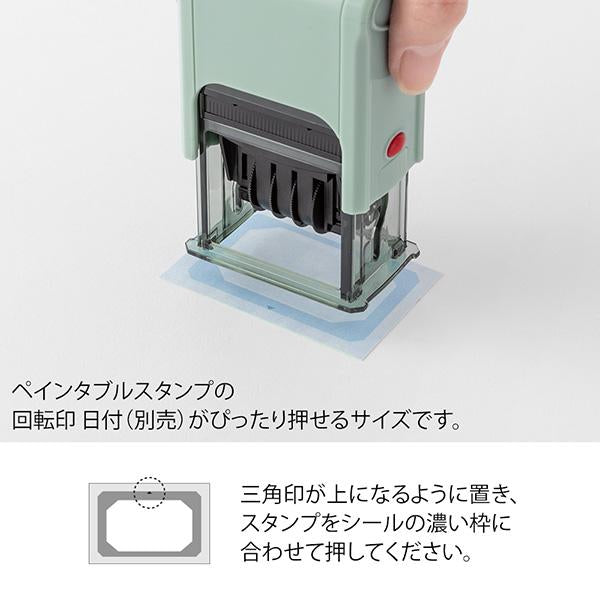 With a guide, you can press the stamp cleanly Place the triangle mark on the sticker so that it faces up and press the stamp according to the dark border of the sticker.