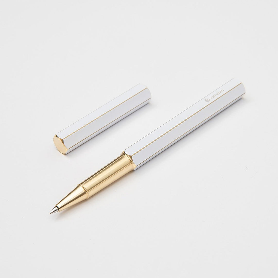Ystudio Classic Revolve Rollerball Pen - White — flat lay