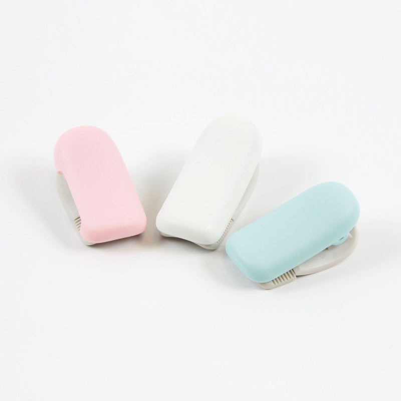 Kokuyo Karu Cut Tape Cutter Clip-Type (10-15mm) Pink — applied on surface