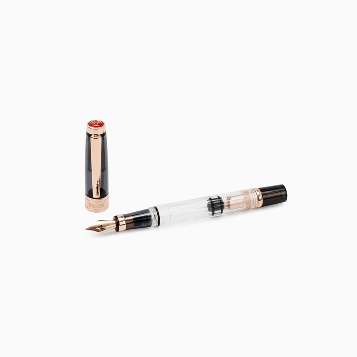 TWSBI Diamond 580 Fountain Pen Smoke RG II — flat lay