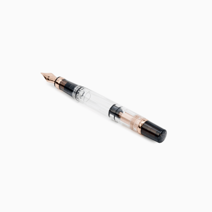 TWSBI Diamond 580 Fountain Pen Smoke RG II — flat lay