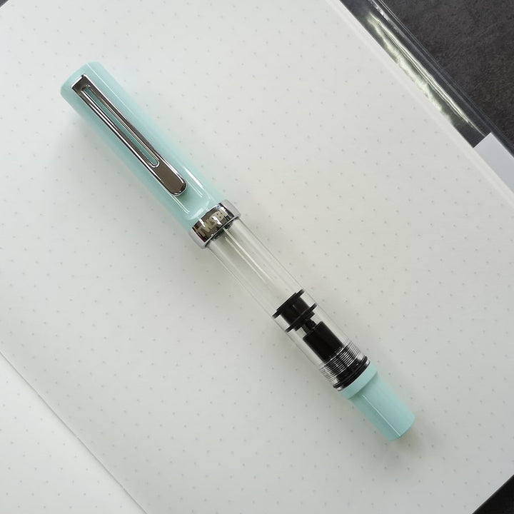 TWSBI ECO-T Fountain Pen Mint Blue — flat lay
