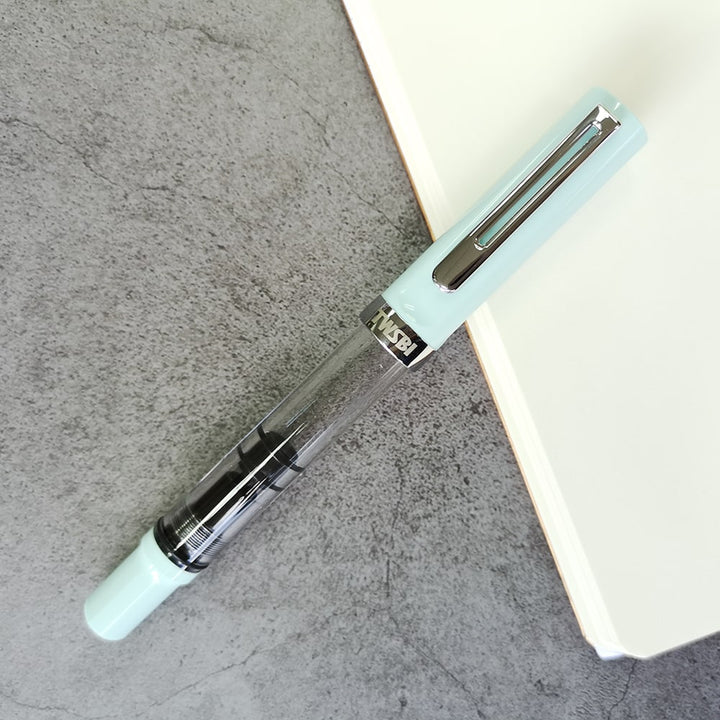 TWSBI ECO-T Fountain Pen Mint Blue — flat lay