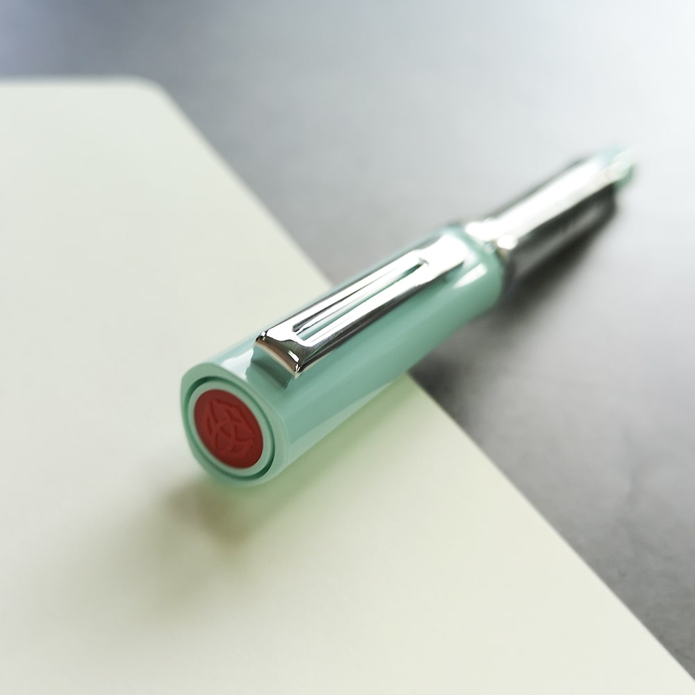 TWSBI ECO-T Fountain Pen Mint Blue — flat lay