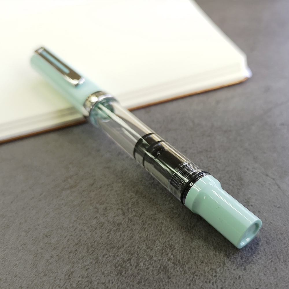 TWSBI ECO-T Fountain Pen Mint Blue — flat lay